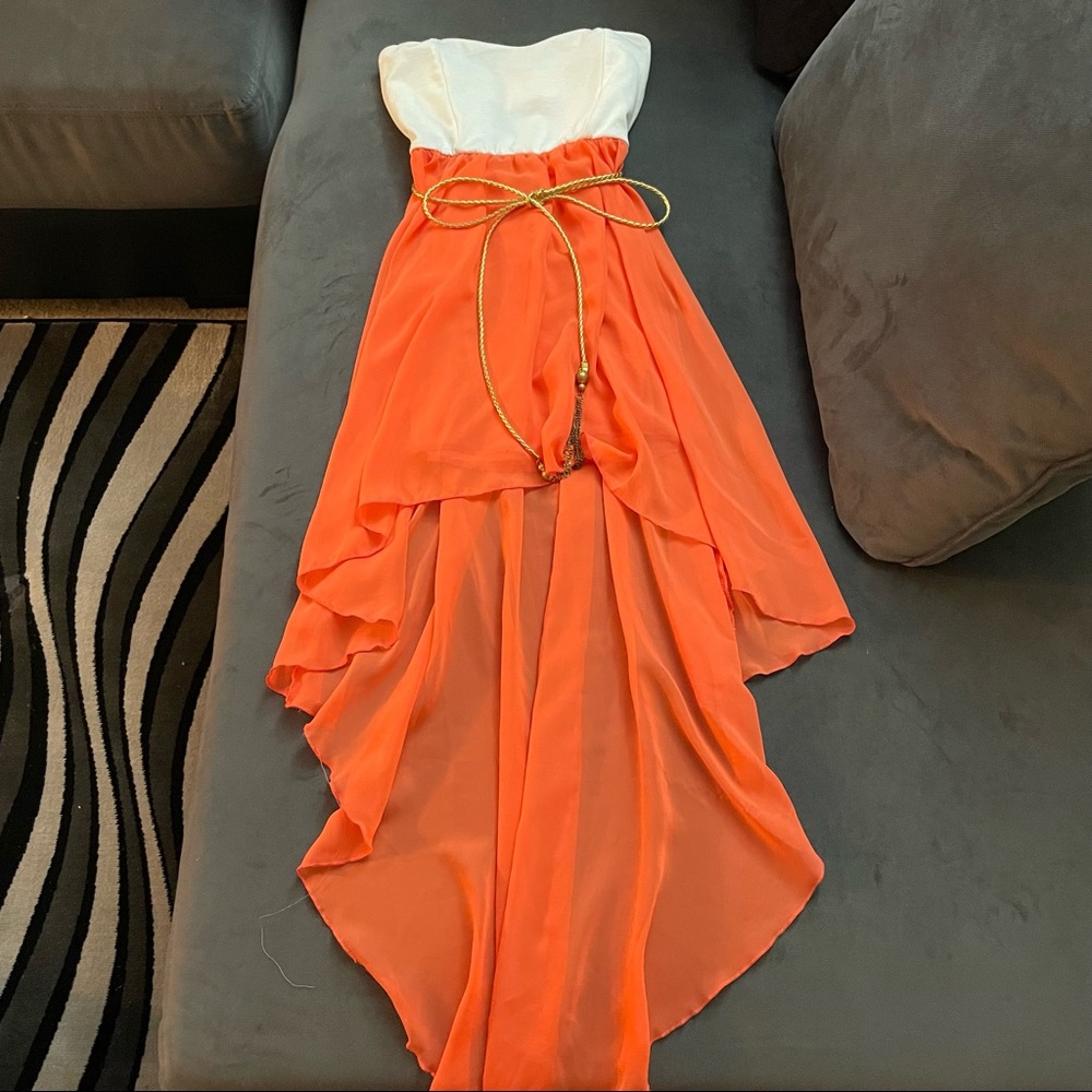 Strapless, orange and cream high-low dress with gold belt
